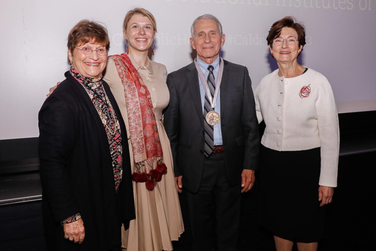 A posed photo of Francesca Calderone-Steichen, Ariana Stahmer, Anthony Fauci, Dean Linda P. Fried