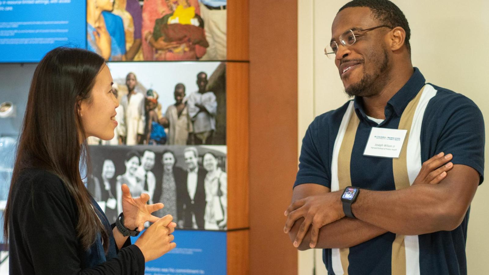 adult professional man and woman having a casual conversation during a SHARP training break