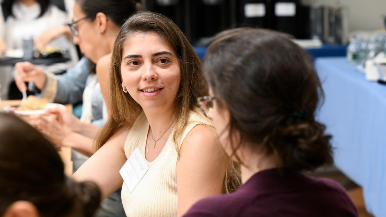Two female attendees talk during a SHARP training