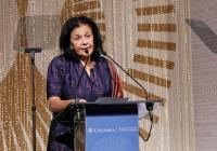 Wafaa El-Sadr speaks at a podium