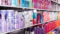Shelves of beauty products in containers of many colors