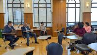 C-ARCH faculty and students discussing in a classroom