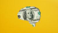 Illustration of a brain overlaid with a $100 bill