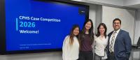 Four students pose next to a screen advertising the CPHS Case Competition