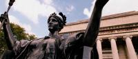 Wide-angle shot of Alma Mater statue in front of Low Library on the Columbia Morningside campus
