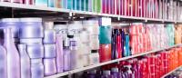 Shelves of beauty products in containers of many colors