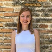 Irene Martinez Morata headshot against brick wall